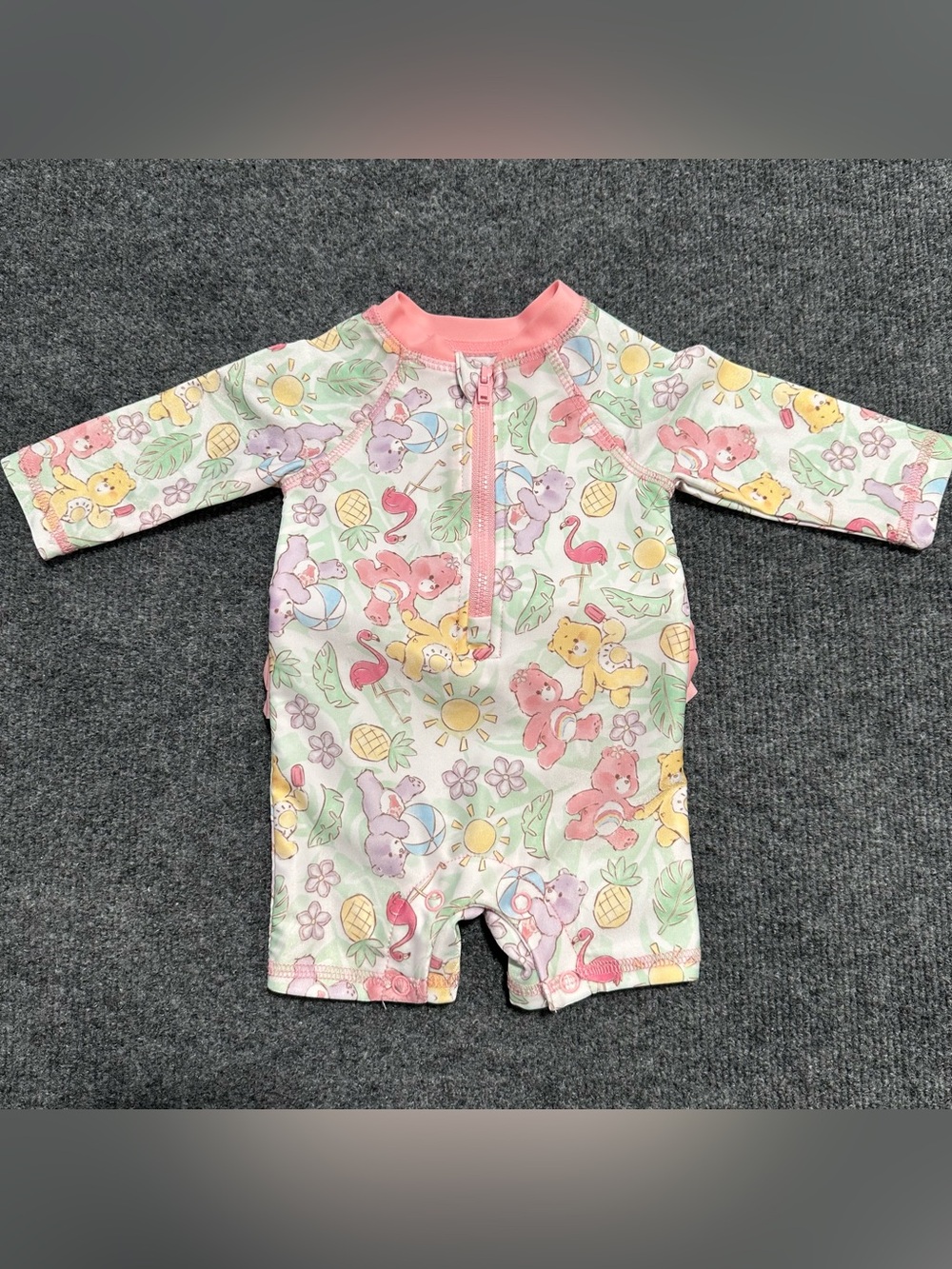 Care Bears Pastel Multi-Color Long Sleeve One-Piece with Pink Trim